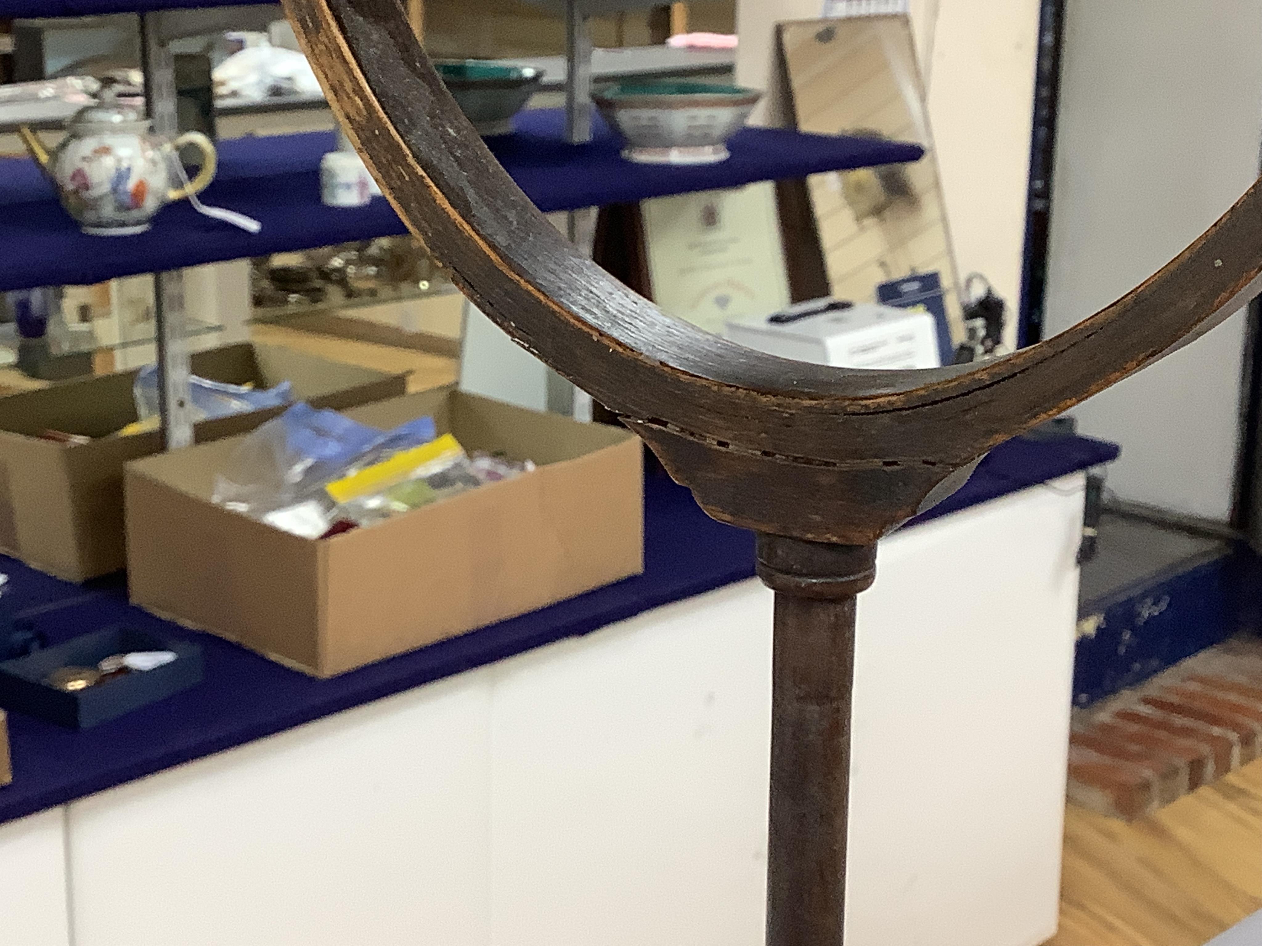 A Victorian mahogany gentleman's shaving mirror on stand with circular shelf, 65cm high.